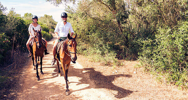Couple Enjoying horseback riding at casa teresa