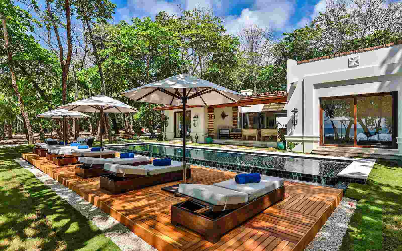 Casa Teresa Luxury Villas pool, patios, and outdoor platform ideal for yoga and meditation retreats with easy beach access